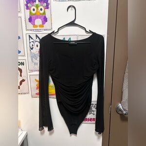 Black body suit with loose lace sleeves